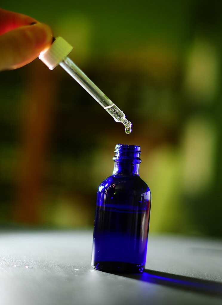 botella-azul-con-gotero-opti