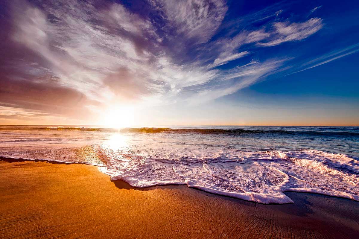 playa-atardecer-opti